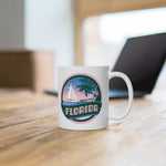 White mug with Florida Road Trip logo sitting on a table