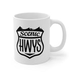 Front view of white mug with Scenic Hwys logo