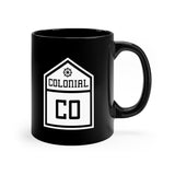 Front view of black mug with Colonial logo