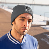 Man wearing gray beanie with Scenic Hwys logo embroidered on front