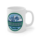 Front view of white mug with Colorado road trip logo