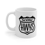 Front view of white mug with Scenic Hwys logo